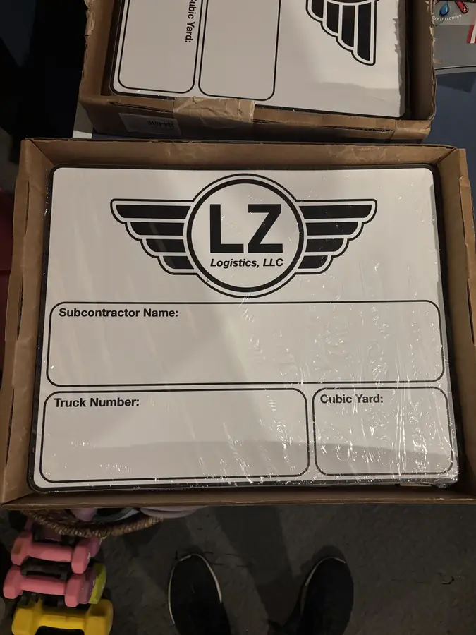 LZ Logistics removable truck decals with subcontractor name, truck number and cubic yard fields